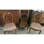 A pair of cabriole leg chairs and a matching nursing chair.