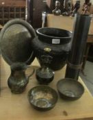 A bronze pot and 6 other items.