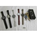 8 Gent's quartz wrist watches all in working order.