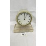 A French alabaster mantel clock, in working order.