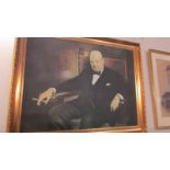 A gilt framed portrait print of Winston Churchill, signed and dated 1942.