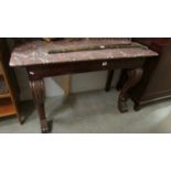 A marble topped console table. ****Condition report**** Width 124cm. Depth 52cm.