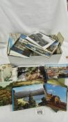 A large collection of postcards and photographs etc.