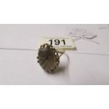 A 9ct gold and smoky quartz dress ring, size Q.