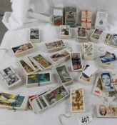 A good lot of loose odd cigarette cards.