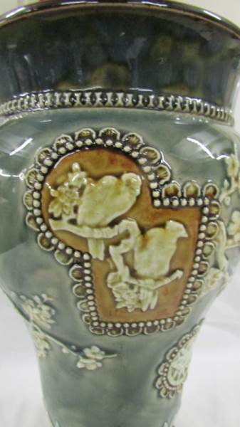 A Doulton Lambeth 26 cm vase decorated with birds, butterflies, - Image 2 of 5