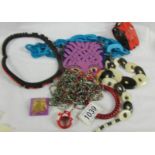 A quantity of colourful jewellery.