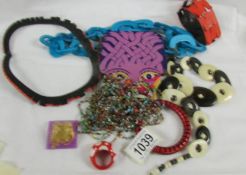 A quantity of colourful jewellery.