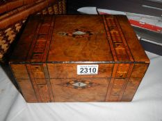 A Victorian inlaid sewing box.