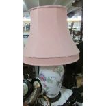 A good ceramic table lamp complete with shade.