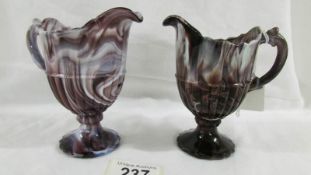 2 Victorian Davidson pressed purple slag glass cream jugs, 12 cm.