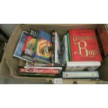A box of children's books including Harry Potter.