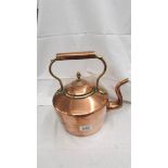 A good quality Victorian copper kettle with unusual hinged lid and acorn knob.