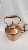 A good quality Victorian copper kettle with unusual hinged lid and acorn knob.