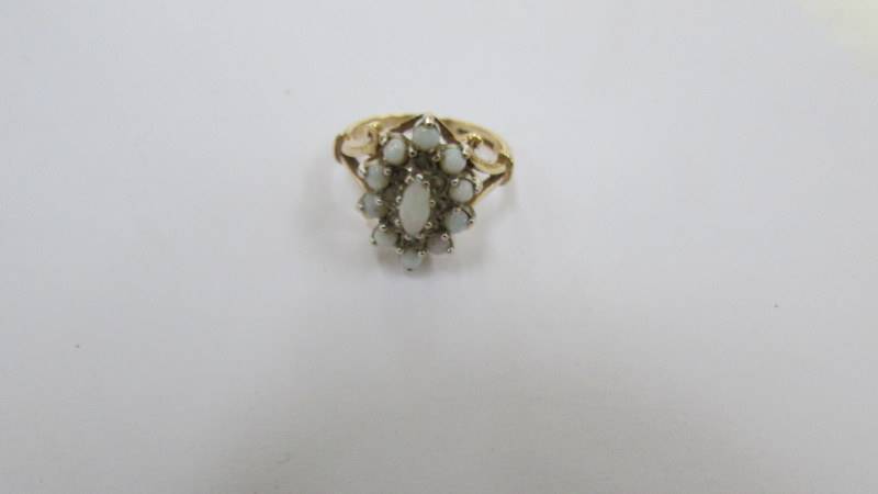 A 9ct gold ring set pearls, size K. - Image 2 of 3