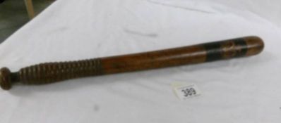 A Victorian truncheon, 44 cm long.