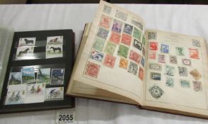 2 albums of stamps.