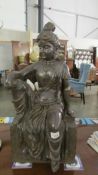 A large statue of Buddha (a good decorators piece).