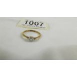An 18ct gold and platinum diamond ring, marked Tat. No. 202591, W G & G, size M.