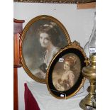2 gilt framed oval portraits of Edwardian ladies.
