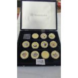 Eleven Elizabeth II Cook Island collector's coins in coin case.