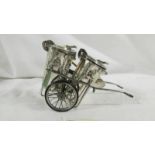 A Hall marked (925) silver novelty cruet in the form of a road sweeper dust cart, 4.