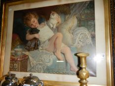 A framed and glazed mid 20th century picture of a girl with cats.