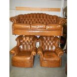 A good quality tan leather three piece suite.