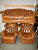 A good quality tan leather three piece suite.