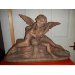 A Richard Aurili original statue of Psyche and Cupid in terracotta, signed.