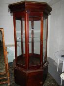 A large octagonal shop display cabinet.