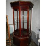 A large octagonal shop display cabinet.