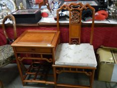 A good quality oriental style telephone seat.