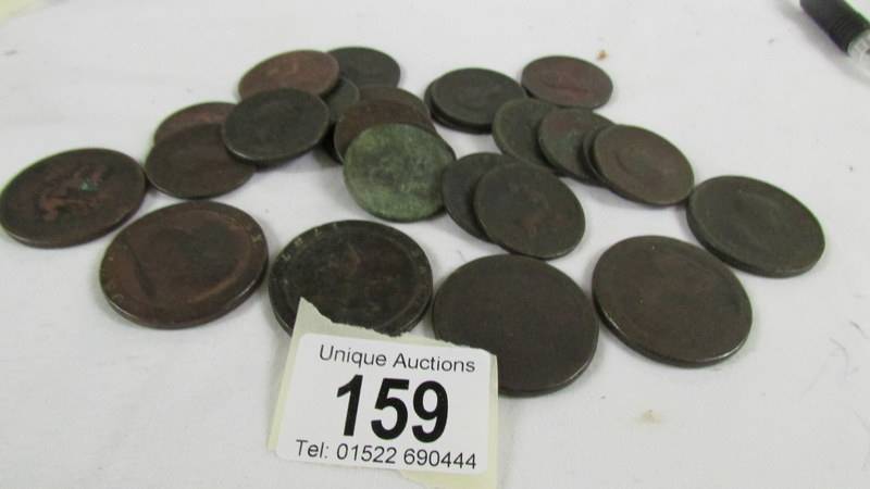 4 cartwheel pennies and 22 other coins.