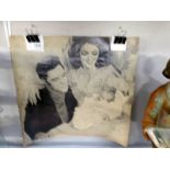 An original charcoal and pencil drawing (sealed) of Elvis, Priscilla and baby Lisa Marie.