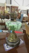 A Victorian oil lamp base with hand painted glass font and Duplex burner. (No shade or chimney).