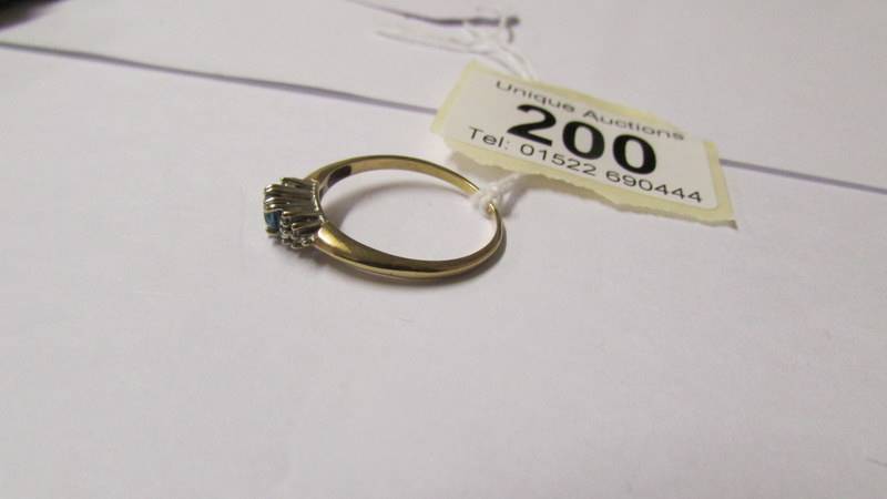 A 9ct gold diamond and topaz dress ring, size T. - Image 3 of 3