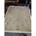 An early 19th century sampler, Ann Psilthorpe, 1834, aged 13. Faded and some text illegible.
