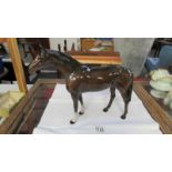 A large Beswick horse.