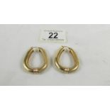 A pair of 9ct gold earrings, 5.5 grams.