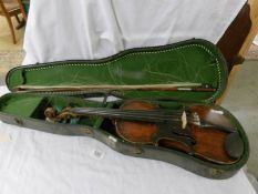 An old cased violin and bow, a/f. ****Condition report**** Back length 36cm.
