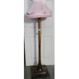 A lovely quality wooden standard lamp with shade.