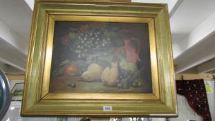 A gilt framed oil on canvas still life study of fruit.