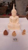 A Resin Buddha and 3 smaller examples.