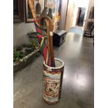 An oriental umbrella stand with contents ****Condition report**** Dirty inside but
