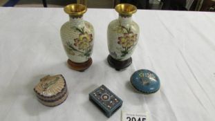A pair of cloissonne vases, 2 trinket boxes and a matchbox holder.
