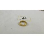 A 22 ct gold wedding ring, size M, 5.2 grams.