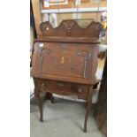 A small inlaid bureau.