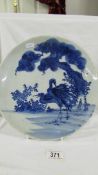 An early Chinese blue and white plate featuring herons.