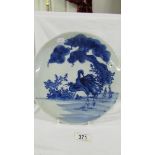 An early Chinese blue and white plate featuring herons.